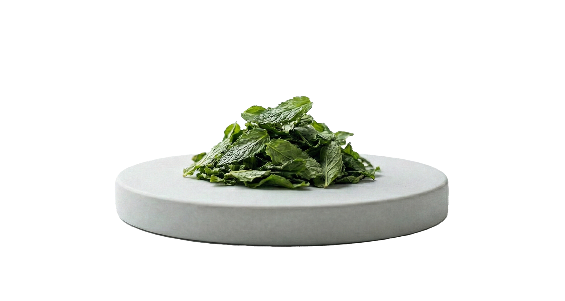Dried leaves of Himalayan spearmint tea arranged on a round stone platform for herbal tea lovers