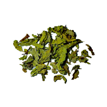 Dried leaves of Himalayan spearmint tea showcasing vibrant green color and fresh texture